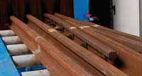 SciTeeX - Schleuderrad Rollenbahn Strahlanlage - vor der Aufbereitung der rostigen Schienenanlage / Gleisanlage